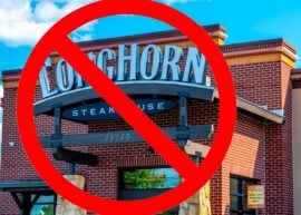 Restaurant facade with a red prohibition symbol overlay.