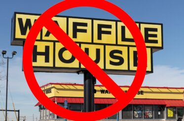 Waffle House sign with a big red "cancel" symbol over it