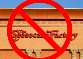 The Cheesecake Factory sign with a big red "cancel" symbol over it