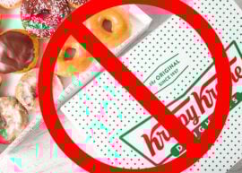 Krispy Kreme box with donuts in it and a big red cancel sign over it