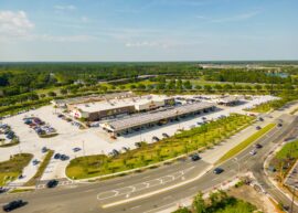 Overhead shot of a Buc-ee's off a highway.