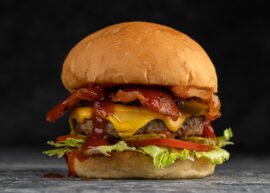 Bacon cheeseburger with lettuce, tomato, and a nice bun