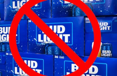 Cases of Bud Light with a big red "cancel" symbol in front of them