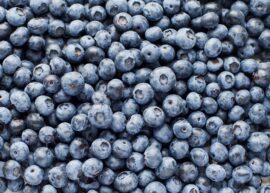 Close-up view of fresh blueberries piled together.