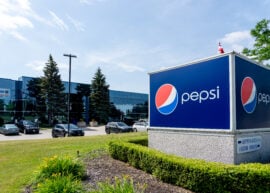 Pepsi sign in front of an office building