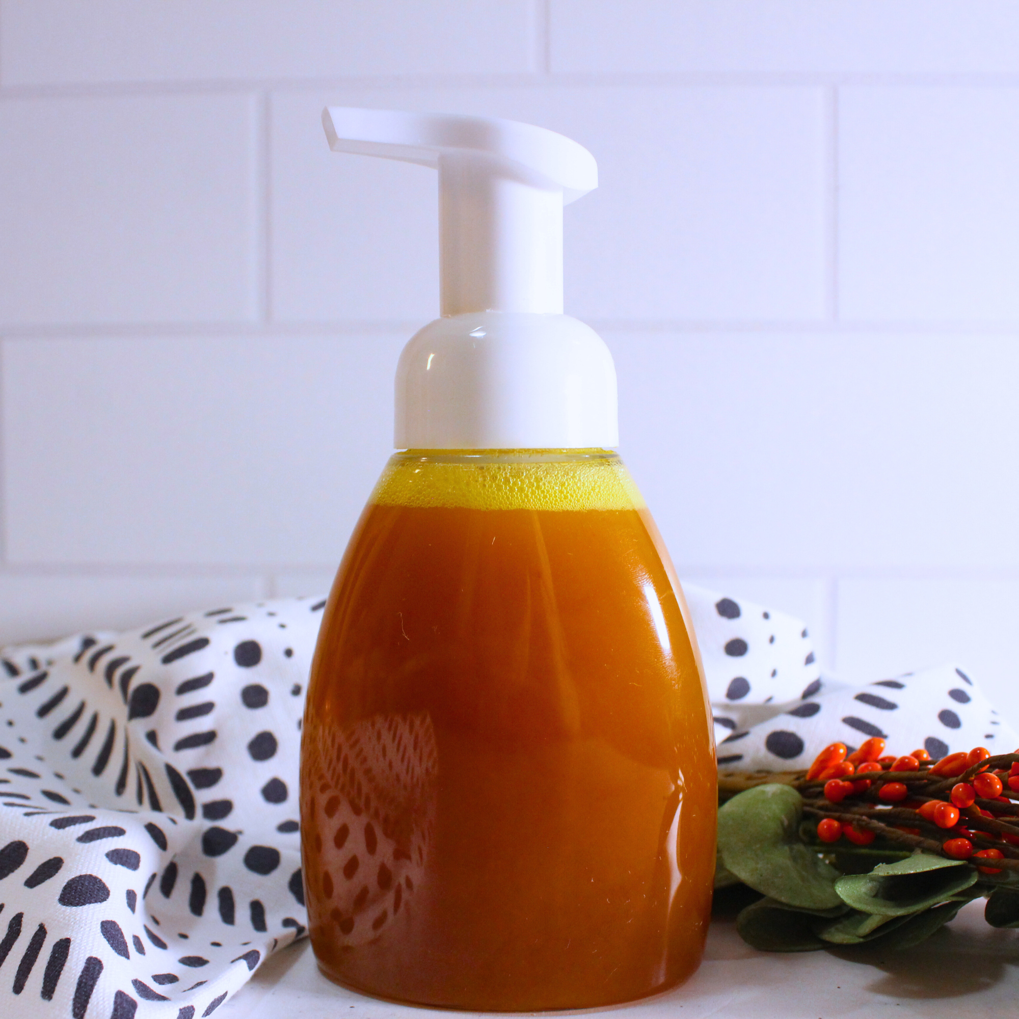 Homemade turmeric cleanser in a foaming pump bottle.