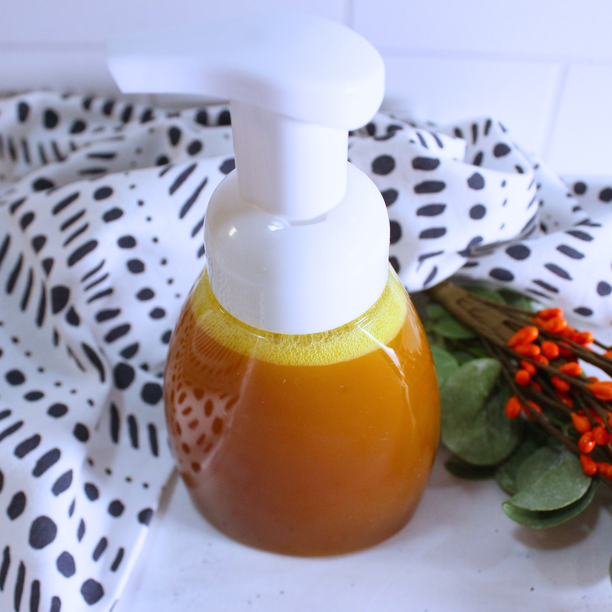 Homemade turmeric cleanser in a foaming pump bottle.