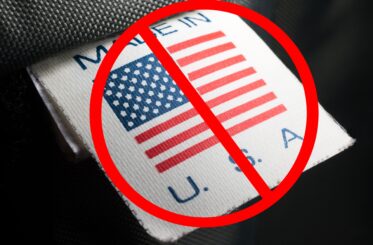 Made in USA label with "no" sign over it
