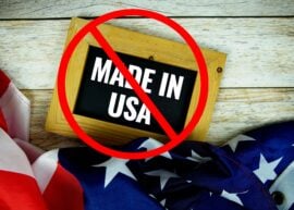 Made in USA text message with USA flag on wooden background with "no" sign