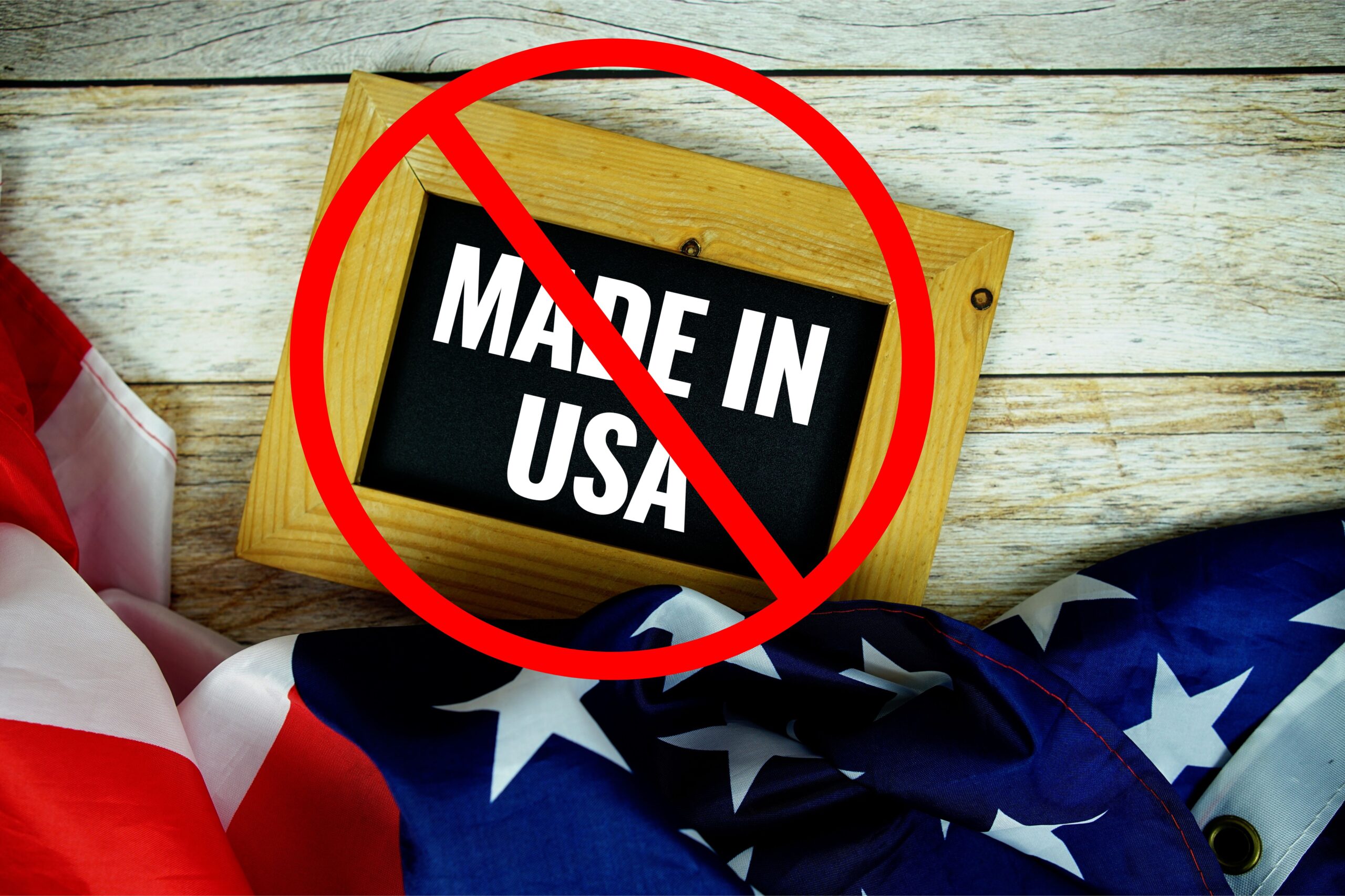 Made in USA text message with USA flag on wooden background with "no" sign