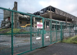 Factory being demolished with "no entry" sign