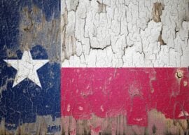 Texas flag and paint cracks. Prison concept with border image. Texas is currently heading toward recession. Inflation. employment. economic recession. Double exposure hologram