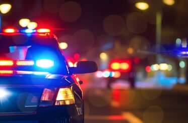 Police cars with flashing lights