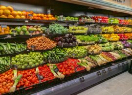 Grocery refrigerator case with fresh produce