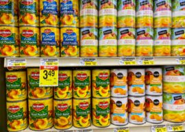 Del Monte canned fruit on a grocery store shelf