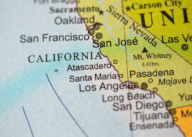 Map view of California on a geographical globe.