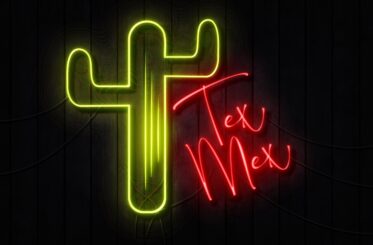Neon sign with 'Tex Mex' in writing and a cactus outline