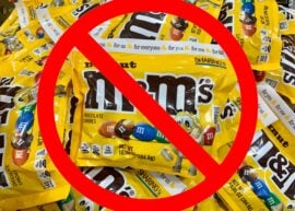 Peanut M&M's packages with a ban sign over them.