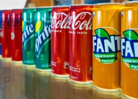 Various soda cans including Fanta, Coca-Cola, and Sprite.