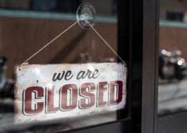 We are Closed sign in a window